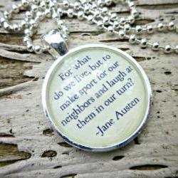 Jane Austin. Pride & Prejudice. Round silver bezel and glass ball chain necklace. For what do we live, but to make sport for our neighbors and laugh at them in our turn. Glass Dome. Metal bezel. Ball chain.