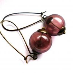 Grapes. Vintaj bead caps, antique brass kidney ear wires, Vintaj wire. Purple lampwork hollow glass. Glass purple earrings. Bohemian. Simple. Earrings. Purple and brown.